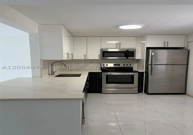 Photo 2 of Condo for sale at 1401 Ne 191st St #D201, Miami, FL 33179 | MLS# A12004873 | Listing updated on 2026-09-06
