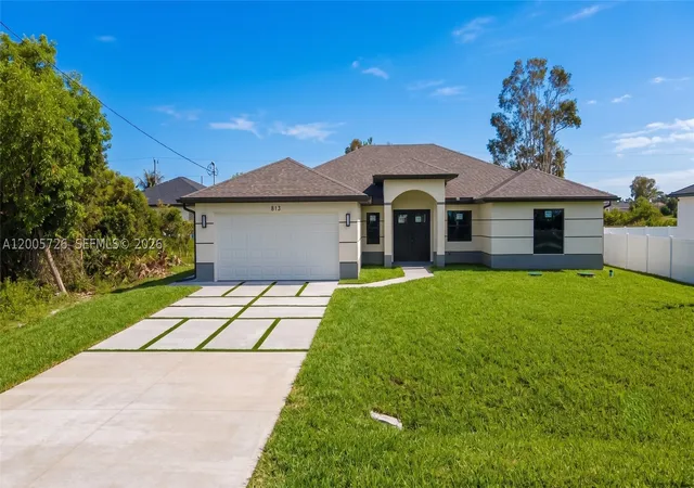 Photo 1 of Single family home for sale at 813 Bell Blvd S, Lehigh Acres, FL 33974 | MLS# A12005726 | Listing updated on 2026-09-03
