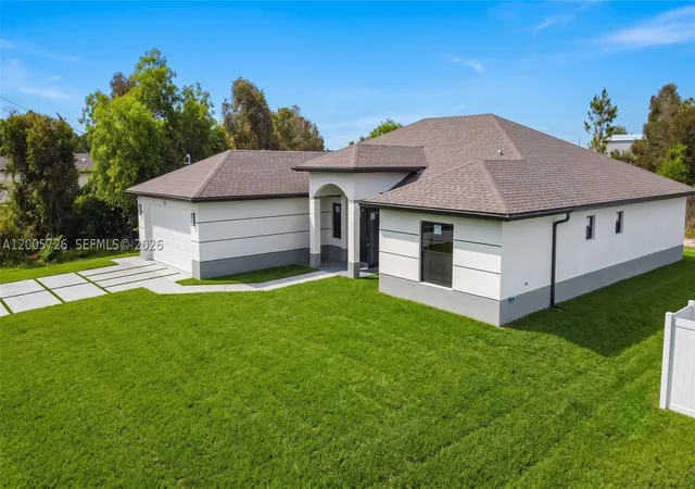 Photo 2 of Single family home for sale at 813 Bell Blvd S, Lehigh Acres, FL 33974 | MLS# A12005726 | Listing updated on 2026-09-03