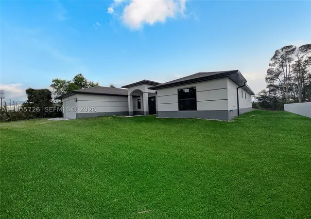 Photo 4 of Single family home for sale at 813 Bell Blvd S, Lehigh Acres, FL 33974 | MLS# A12005726 | Listing updated on 2026-09-03
