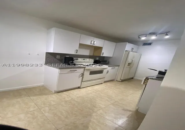Photo 3 of Condo for sale at 9761 Nw 46th Ter #107, Doral, FL 33178 | MLS# A11998233 | Listing updated on 2026-09-01