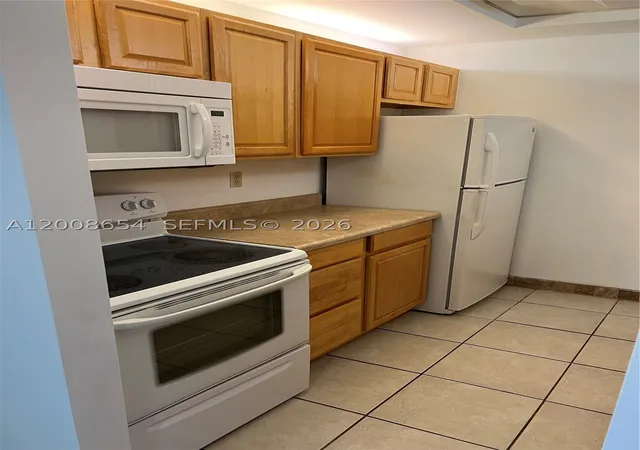 Listing Photo 1 - Condo for sale in building located at 4116 Nw 88Th Ave, Coral Springs, FL 33065 - Unit #104