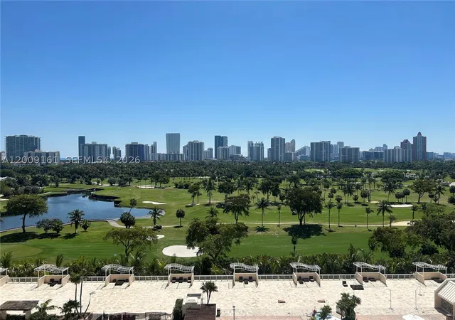 Listing Photo 1 - Condo for sale in building located at 20301 W Country Clb Dr, Miami, FL 33180 - Unit #1224