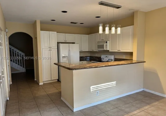 Photo 3 of Townhouse for sale at 2971 Nw 33rd Way, Lauderdale Lakes, FL 33311 | MLS# A12011155 | Listing updated on 2026-09-08