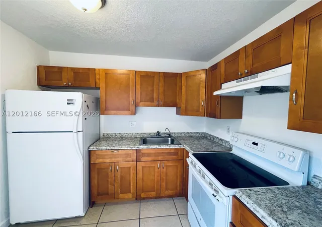 Photo 1 of Townhouse for sale at 825 Nw 46th Ave #825, Plantation, FL 33317 | MLS# A12012166 | Listing updated on 2026-09-02