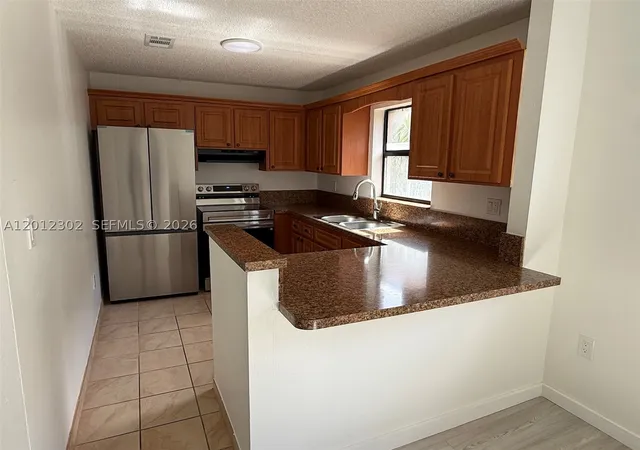 Photo 2 of Condo for sale at 6850 Nw 173rd Dr #109, Hialeah, FL 33015 | MLS# A12012302 | Listing updated on 2026-09-18