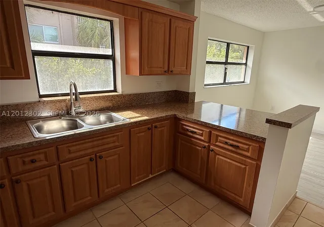 Photo 3 of Condo for sale at 6850 Nw 173Rd Dr #109, Hialeah, FL 33015 | MLS# A12012302 | Listing updated on 2026-09-18