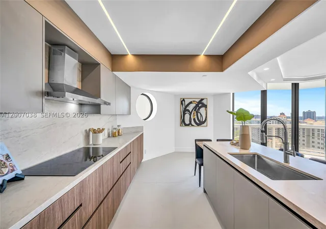 Listing Photo 1 - Condo for sale in building located at 20185 E Country Clb Dr, Miami, FL 33180 - Unit #1904