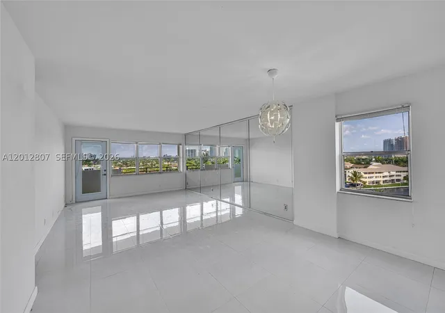 Photo 2 of Condo for sale at 401 Golden Isles Dr #712, Hallandale Beach, FL 33009 | MLS# A12012807 | Listing updated on 2026-09-16