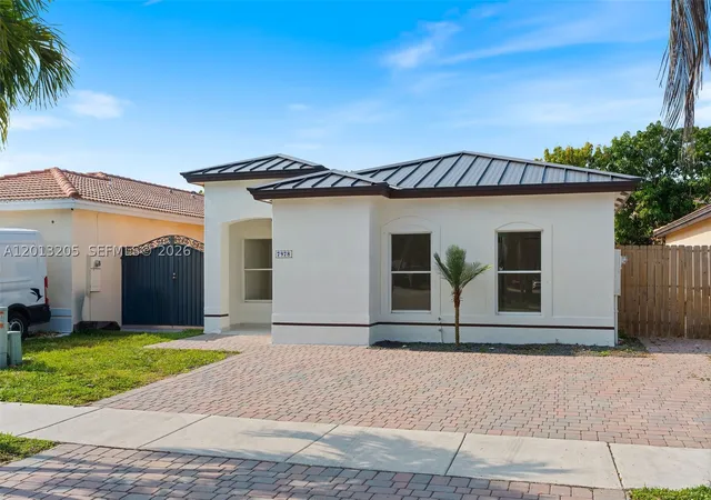 Listing Photo 1 - Condo for sale at Spanish Lakes 2Nd Addn, Unit 7978 Nw 200Th St, Spanish Lakes 2Nd Addn, Miami, FL 33015 | Built Year: 1996-2002