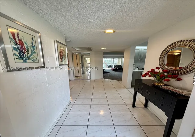 Photo 3 of Condo for sale at 571 Sw 141St Ave #208N, Pembroke Pines, FL 33027 | MLS# A12005813 | Listing updated on 2026-09-14