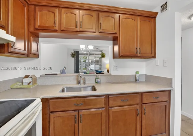 Photo 3 of Condo for sale at 9090 Lime Bay Blvd #203, Tamarac, FL 33321 | MLS# A12013845 | Listing updated on 2026-09-17