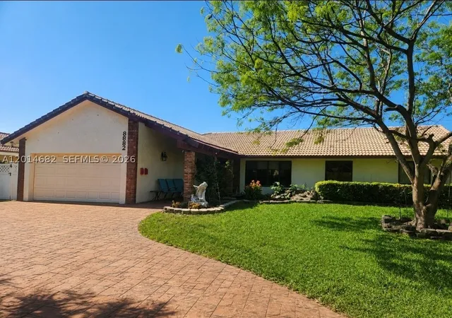Photo 1 of Single family home for sale at 8882 Sw 1st Pl, Coral Springs, FL 33071 | MLS# A12014682 | Listing updated on 2026-09-13