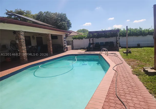 Photo 2 of Single family home for sale at 8882 Sw 1st Pl, Coral Springs, FL 33071 | MLS# A12014682 | Listing updated on 2026-09-13
