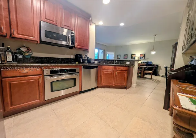 Photo 3 of Condo for sale at 16101 Emerald Estates Dr #254, Weston, FL 33331 | MLS# A12015716 | Listing updated on 2026-09-03
