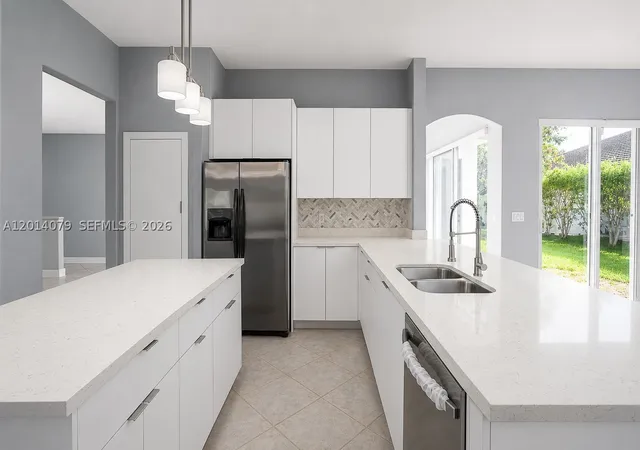 Photo 2 of Single family home for sale at 1101 Nw 180th Ave, Pembroke Pines, FL 33029 | MLS# A12014079 | Listing updated on 2026-09-01