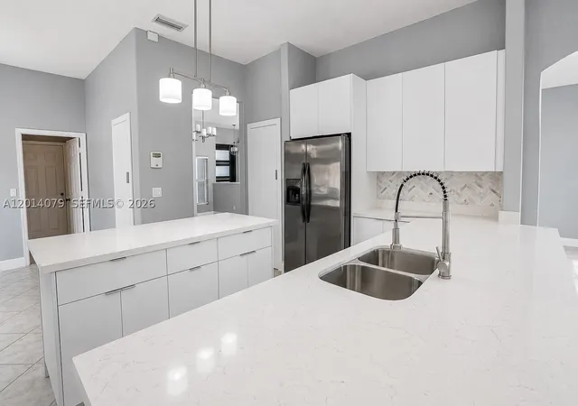 Photo 3 of Single family home for sale at 1101 Nw 180th Ave, Pembroke Pines, FL 33029 | MLS# A12014079 | Listing updated on 2026-09-01