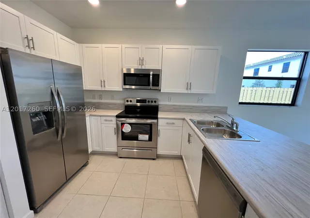 Photo 3 of Townhouse for sale at 11944 Sw 244th Ln, Homestead, FL 33032 | MLS# A12017260 | Listing updated on 2026-09-29