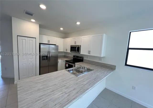 Photo 3 of Townhouse for sale at 11944 Sw 244Th Ln, Homestead, FL 33032 | MLS# A12017260 | Listing updated on 2026-09-29