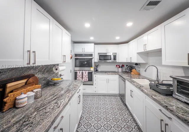 Photo 1 of Condo for sale at 90 Edgewater Dr #114, Coral Gables, FL 33133 | MLS# A12017003 | Listing updated on 2026-08-28