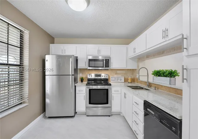 Photo 1 of Condo for sale at 2382 Nw 89th Dr #2382, Coral Springs, FL 33065 | MLS# A12019495 | Listing updated on 2026-09-15