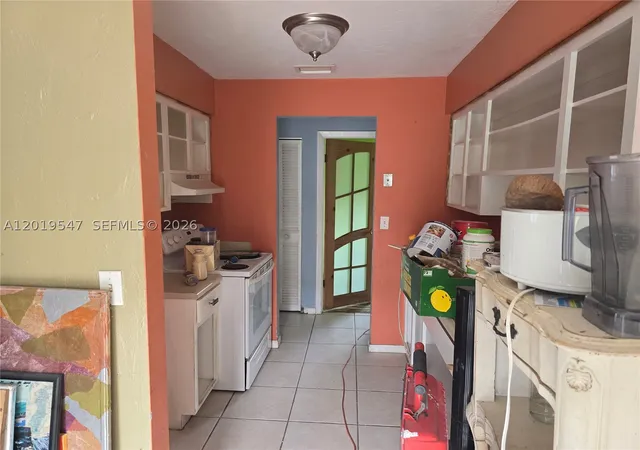 Photo 3 of Single family home for sale at 242 Nw 7th Ave, Dania Beach, FL 33004 | MLS# A12019547 | Listing updated on 2026-09-15