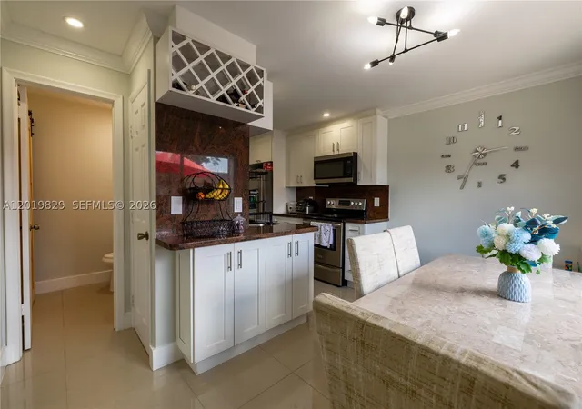 Photo 4 of Townhouse for sale at 2130 Sherwood Forest Blvd #13, West Palm Beach, FL 33415 | MLS# A12019829 | Listing updated on 2026-09-11