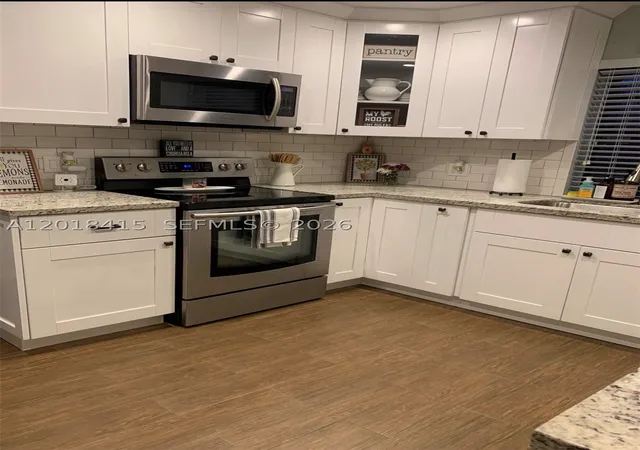 Listing Photo 5 - Condo for sale in building located at 11325 Sw 133Rd Ct, Miami, FL 33186 - Unit #51-3
