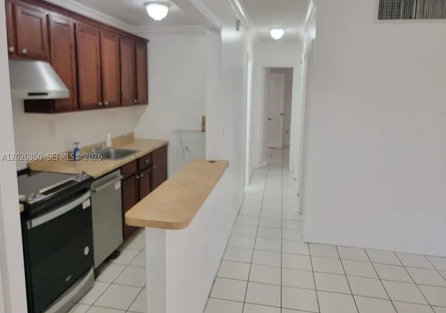 Photo 3 of Condo for sale at 4410 Nw 79th Ave #1C, Doral, FL 33166 | MLS# A12020350 | Listing updated on 2026-10-05