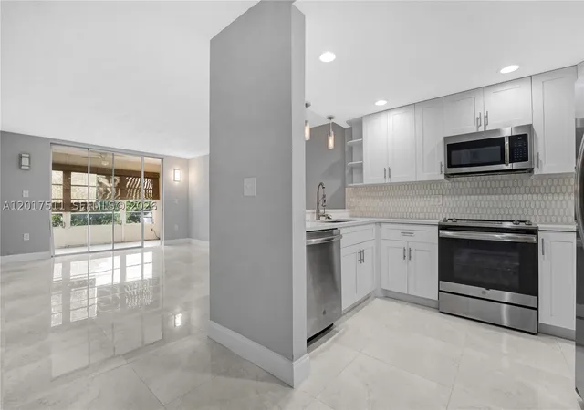 Photo 2 of Condo for sale at 7100 Nw 17th St #305, Plantation, FL 33313 | MLS# A12017511 | Listing updated on 2026-09-03