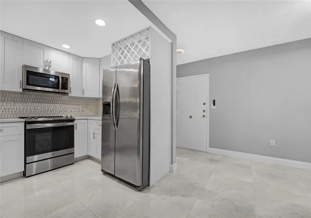 Photo 3 of Condo for sale at 7100 Nw 17th St #305, Plantation, FL 33313 | MLS# A12017511 | Listing updated on 2026-09-03