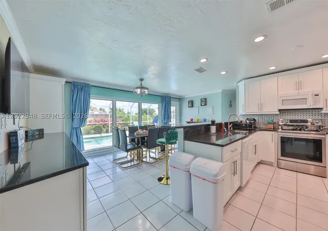 Photo 3 of Single family home for sale at 503 Sw 17th St, Cape Coral, FL 33990 | MLS# A12022948 | Listing updated on 2026-09-14