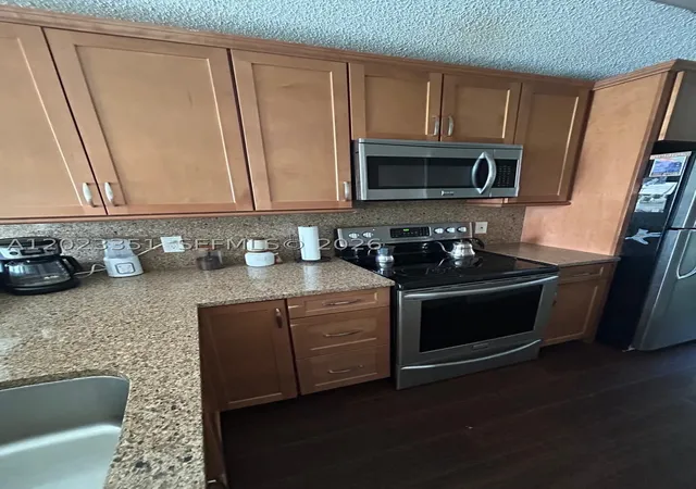 Listing Photo 5 - Condo for sale in building located at 977 Coral Clb Dr, Coral Springs, FL 33071 - Unit #977