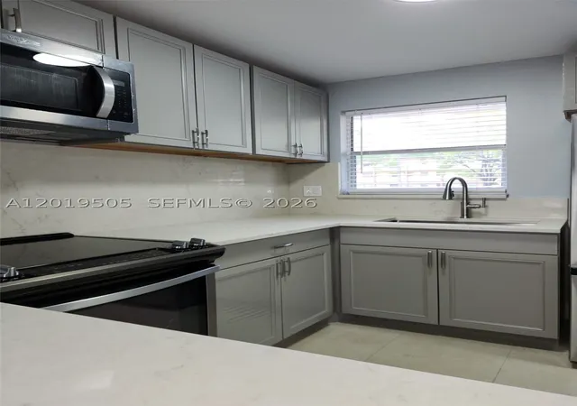 Photo 2 of Condo for sale at 2811 N Pine Island Rd #107, Sunrise, FL 33322 | MLS# A12019505 | Listing updated on 2026-09-12