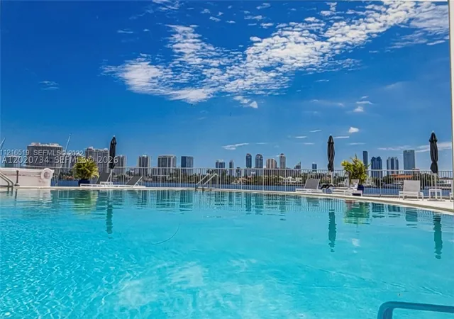 Listing Photo 1 - Condo for sale in building located at 16558 Ne 26Th Ave, North Miami Beach, FL 33160 - Unit #3H