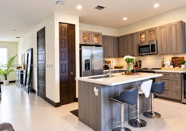 Photo 1 of Townhouse for sale at 16012 Nw 91st Ct, Miami Lakes, FL 33018 | MLS# A12016582 | Listing updated on 2026-09-10