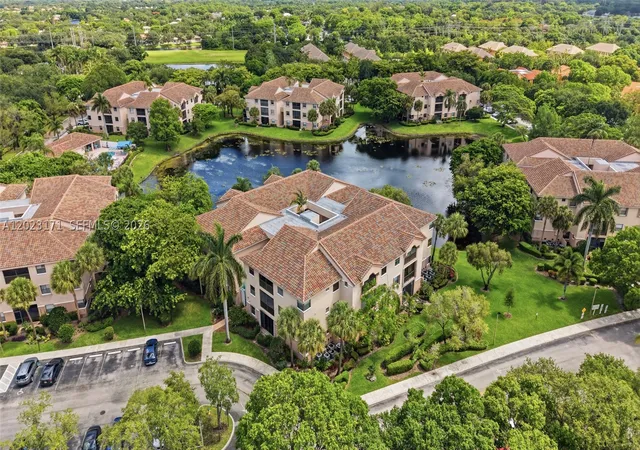 Listing Photo 1 - Condo for sale in building located at 4111 Coral Tree Cir, Coconut Creek, FL 33073 - Unit #327