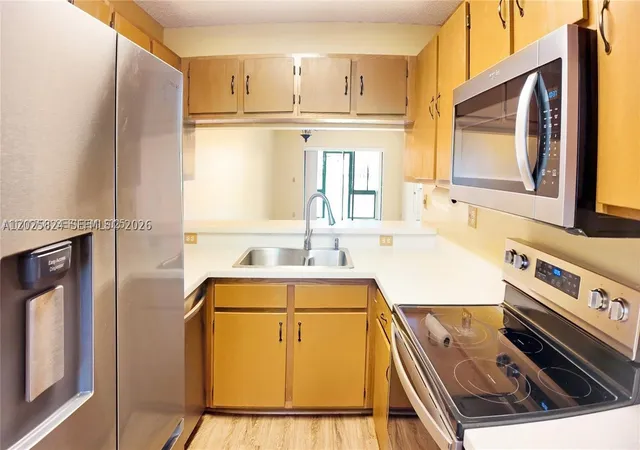 Photo 2 of Condo for sale at 9577 W Mcnab Rd #110, Tamarac, FL 33321 | MLS# A12025824 | Listing updated on 2026-09-24