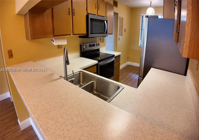 Photo 3 of Condo for sale at 9577 W Mcnab Rd #110, Tamarac, FL 33321 | MLS# A12025824 | Listing updated on 2026-09-24