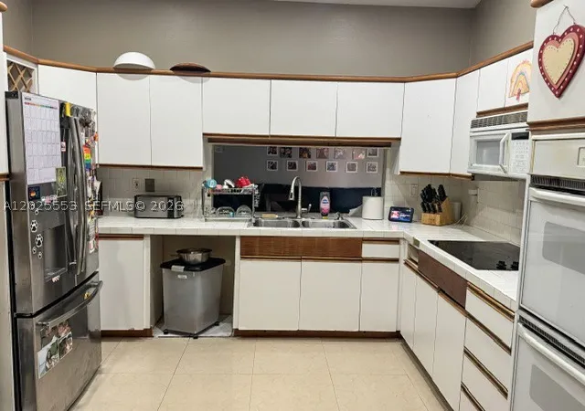 Photo 3 of Sale Pending at 21705 Sw 99th Ave, Cutler Bay, FL 33190 | MLS# A12025553 | Listing updated on 2026-09-11