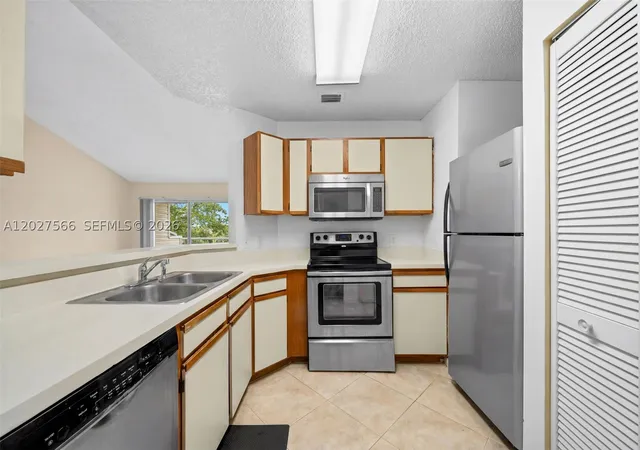 Photo 1 of Condo for sale at 3405 Nw 44th St #205, Lauderdale Lakes, FL 33309 | MLS# A12027566 | Listing updated on 2026-09-08