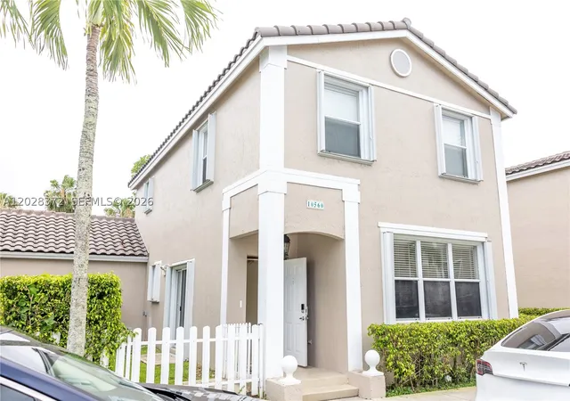 Photo 1 of Townhouse for sale at 10560 Nw 57th Ct, Coral Springs, FL 33076 | MLS# A12028372 | Listing updated on 2026-09-13