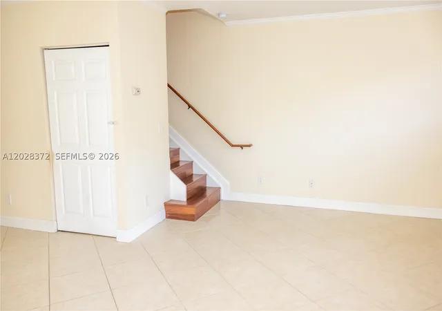 Photo 2 of Townhouse for sale at 10560 Nw 57th Ct, Coral Springs, FL 33076 | MLS# A12028372 | Listing updated on 2026-09-13