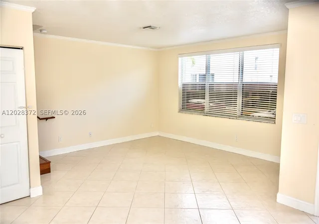 Photo 3 of Townhouse for sale at 10560 Nw 57th Ct, Coral Springs, FL 33076 | MLS# A12028372 | Listing updated on 2026-09-13