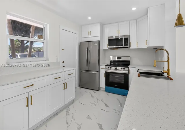 Photo 2 of Condo for sale at 201 Se 11th Ter #102, Dania Beach, FL 33004 | MLS# A12028732 | Listing updated on 2026-10-06