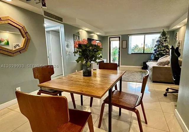 Photo 1 of Condo for sale at 301 Golden Isles Dr #406, Hallandale Beach, FL 33009 | MLS# A12029933 | Listing updated on 2026-09-07