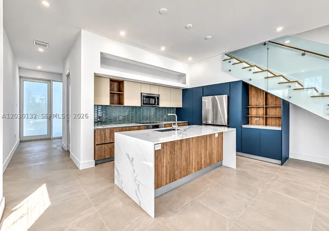 Photo 2 of Townhouse for sale at 2841 Sw 38Th Ct Unit B, Miami, FL 33134 | MLS# A12030132 | Listing updated on 2026-09-10