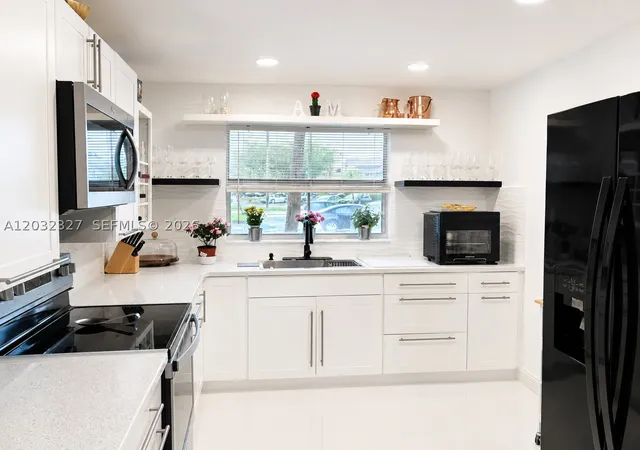 Photo 1 of Condo for sale at 9241 Sunrise Lakes Blvd #109, Sunrise, FL 33322 | MLS# A12032327 | Listing updated on 2026-09-12