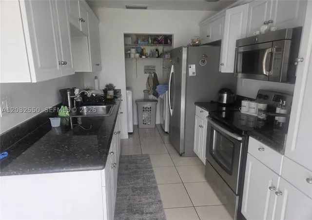 Photo 3 of Single family home for sale at 11871 Sw 123rd Pl, Miami, FL 33186 | MLS# A12032550 | Listing updated on 2026-09-25