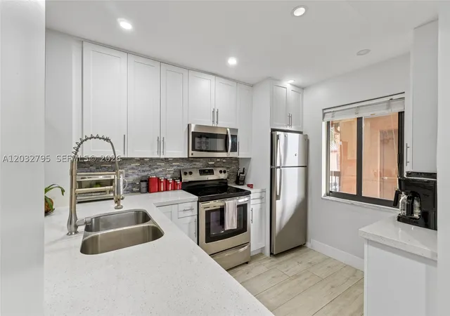 Photo 1 of Sale Pending at 10003 Winding Lake Rd #203, Sunrise, FL 33351 | MLS# A12032795 | Listing updated on 2026-08-26